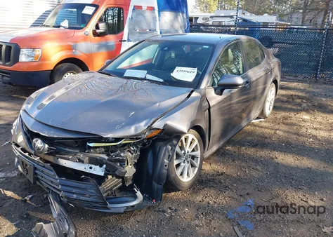 2021 Toyota Camry Le from USA, damaged, VIN 4T1C11AK5MU604069